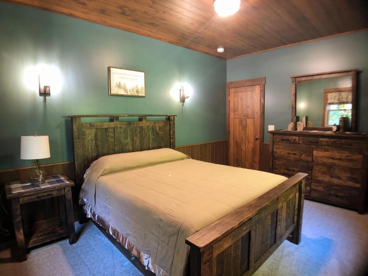 Sojourner'S Lodge & Log Cabin Suites Dundee Bagian luar foto
